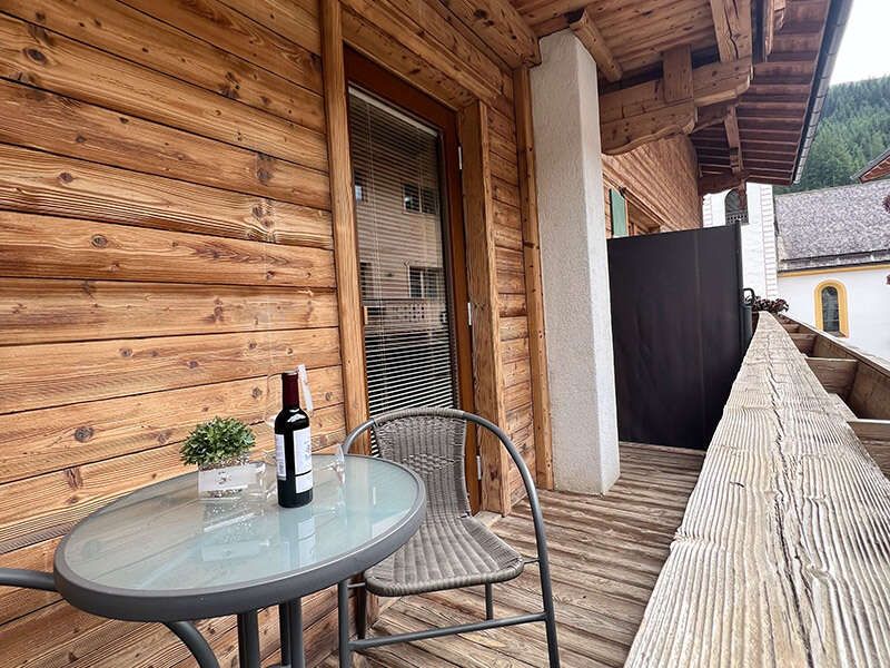 Balcony door and view towards the boundary to the neighboring balcony